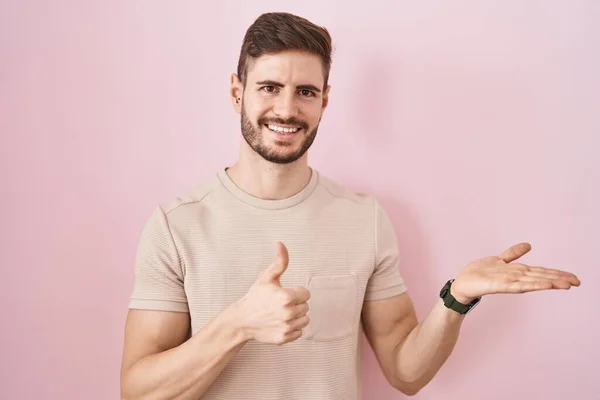Hispanic Man Beard Standing Pink Background Showing Palm Hand Doing — Stock fotografie