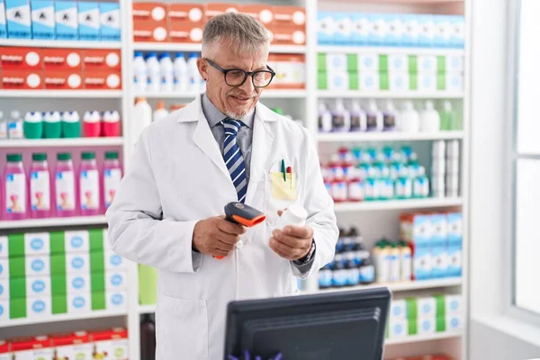 Middle Age Grey Haired Man Pharmacist Scanning Pills Bottle Laboratory — Stock Photo, Image