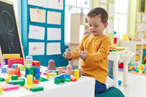 Adorable Caucasian Boy Playing Toys Sitting Floor Kindergarten — Stockfoto