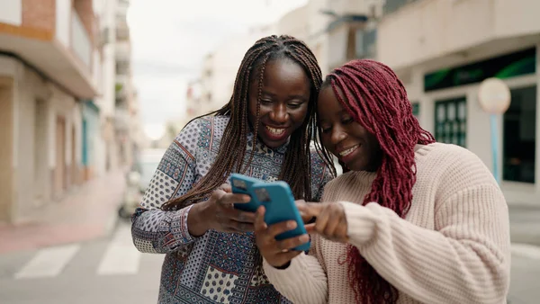 Two African American Friends Smiling Confident Using Smartphone Street — Stock Photo, Image