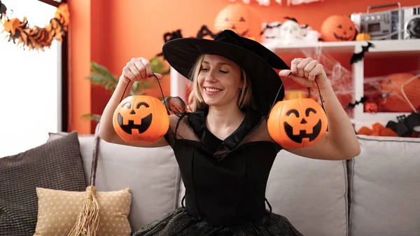 Young Blonde Woman Having Halloween Party Holding Pumpkin Baskets Home — Fotografia de Stock
