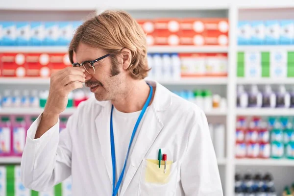 Caucasian Man Mustache Working Pharmacy Drugstore Tired Rubbing Nose Eyes — 图库照片