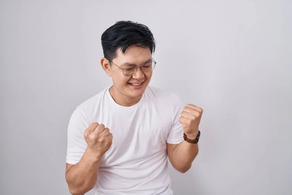 Young Asian Man Standing White Background Very Happy Excited Doing — Stockfoto