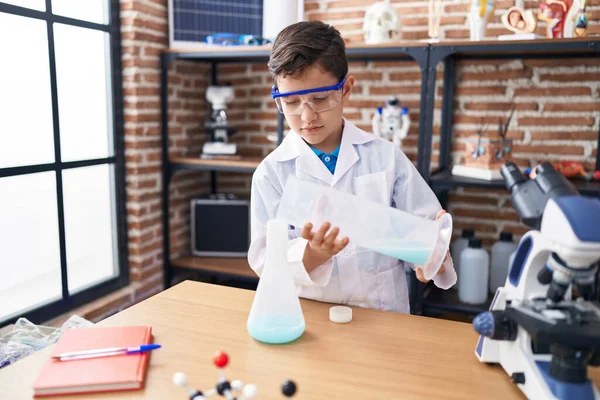 Adorable Hispanic Boy Student Pouring Liquid Test Tube Laboratory Classroom — Φωτογραφία Αρχείου