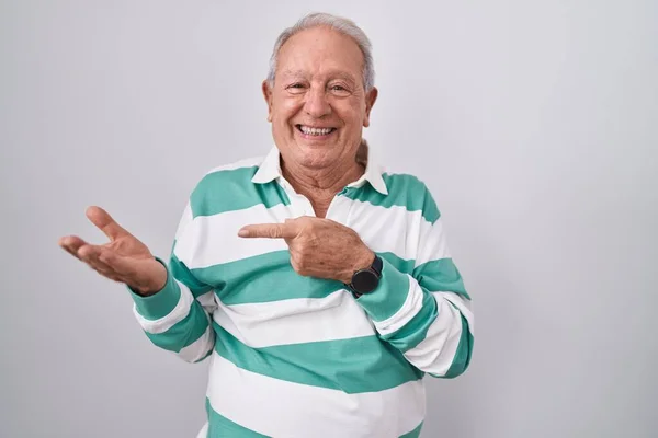 Senior Man Grey Hair Standing White Background Amazed Smiling Camera — Zdjęcie stockowe