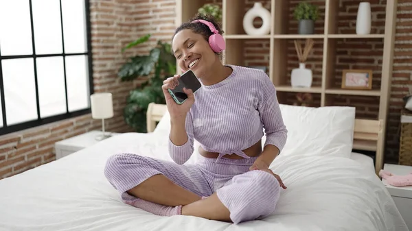 African American Woman Listening Music Singing Song Bedroom — стоковое фото