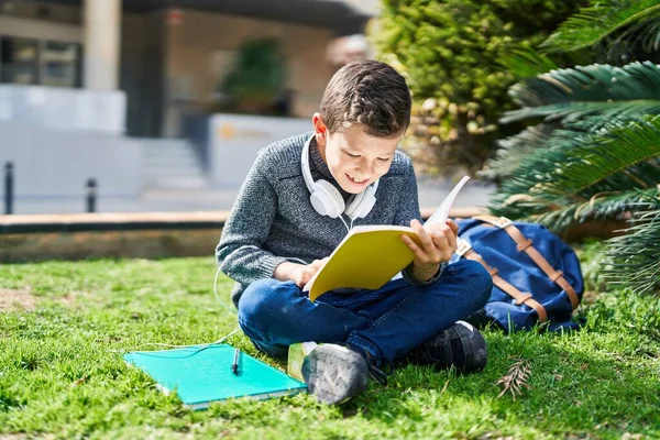 Blond Child Student Reading Book Sitting Grass Park — Stok fotoğraf