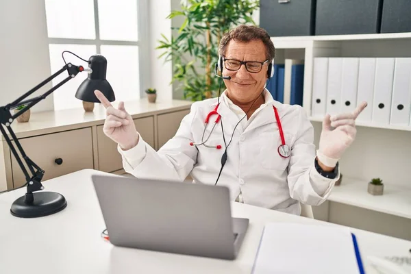 Senior Doctor Man Working Online Appointment Smiling Confident Pointing Fingers — Stock Photo, Image