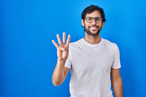 Handsome Latin Man Standing Blue Background Showing Pointing Fingers Number — Stock Photo, Image