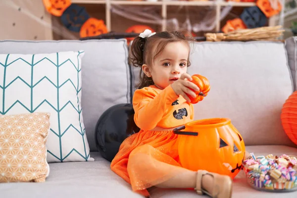 Adorable Hispanic Toddler Having Halloween Party Holding Pumpkin Toy Home —  Fotos de Stock