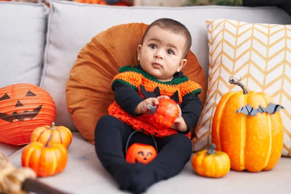 Adorable Hispanic Baby Having Halloween Party Holding Pumpkin Home — Foto de Stock