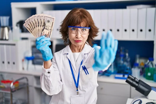 Middle Age Woman Working Scientist Laboratory Holding Money Open Hand — Stock Photo, Image