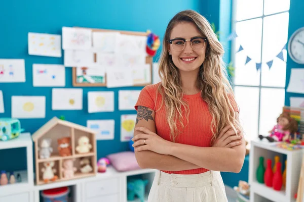 Young Blonde Woman Teacher Smiling Confident Standing Arms Crossed Gesture — Foto de Stock