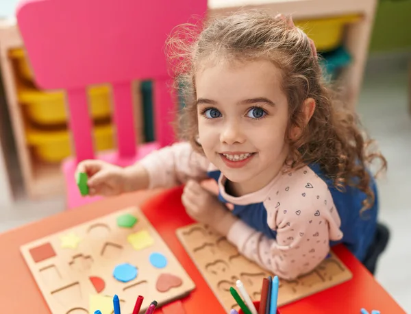 Adorable Blonde Girl Playing Maths Puzzle Game Sitting Table Kindergarten — 스톡 사진