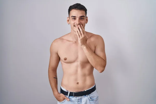 Handsome Hispanic Man Standing Shirtless Laughing Embarrassed Giggle Covering Mouth — Stock Photo, Image