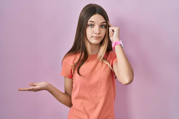 Teenager Girl Standing Pink Background Confused Annoyed Open Palm Showing — Stock Photo, Image