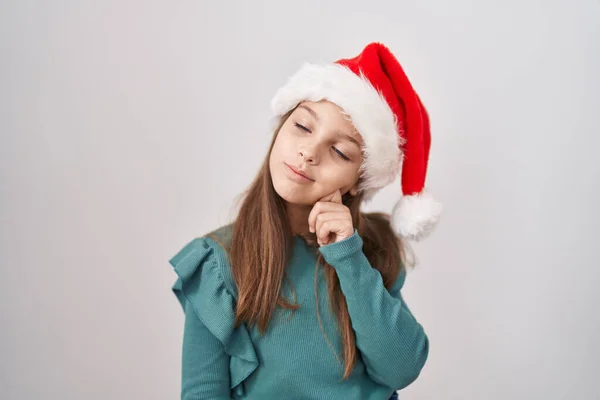 Little Caucasian Girl Wearing Christmas Hat Thinking Concentrated Doubt Finger — Stock fotografie