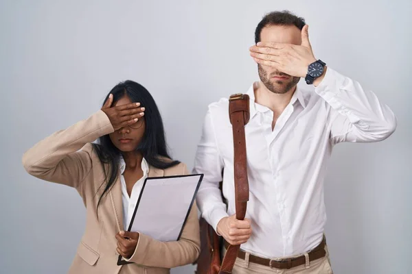 Interracial Business Couple Wearing Glasses Covering Eyes Hand Looking Serious — Foto de Stock