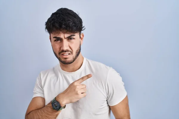 Hispanic Man Beard Standing White Background Pointing Aside Worried Nervous — Stock Photo, Image