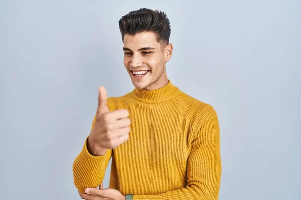 Young Hispanic Man Standing Blue Background Looking Proud Smiling Doing — Stockfoto