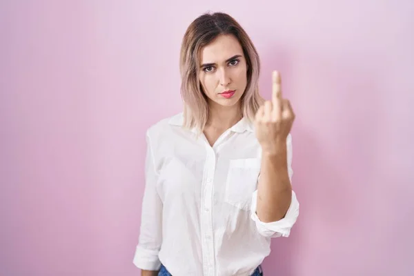 Young Beautiful Woman Standing Pink Background Showing Middle Finger Impolite — Stock fotografie