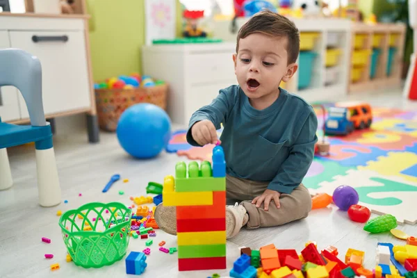 Adorable Hispanic Boy Playing Construction Blocks Sitting Floor Kindergarten — Stock Photo, Image