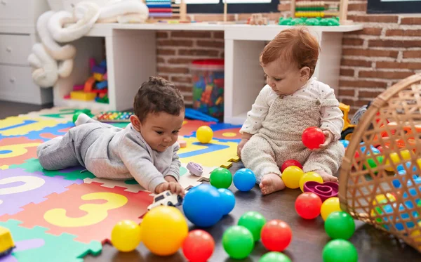 Two Adorable Babies Playing Balls Sitting Floor Kindergarten — Stock Photo, Image