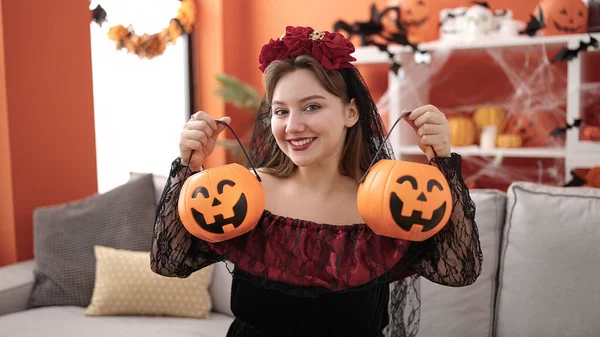 Young Blonde Woman Wearing Katrina Costume Holding Halloween Pumpkin Baskets — Fotografia de Stock