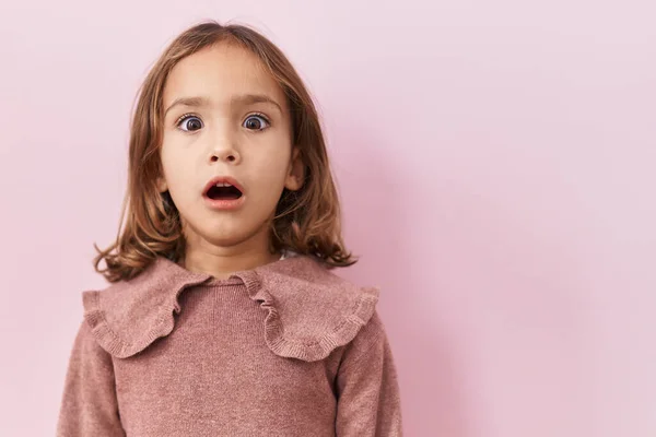 Little Hispanic Girl Standing Pink Background Scared Amazed Open Mouth — Stock Photo, Image