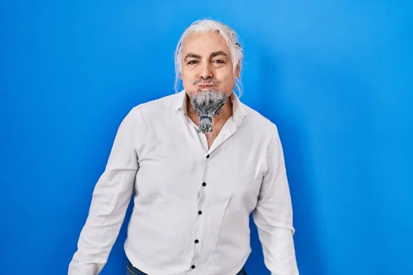 Middle Age Man Grey Hair Standing Blue Background Puffing Cheeks — 图库照片