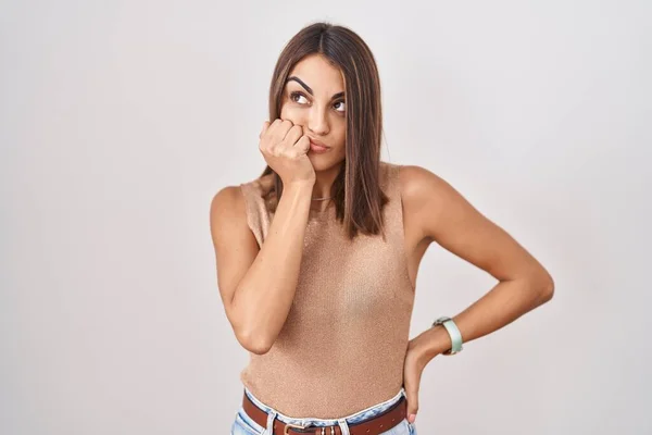 Young Hispanic Woman Standing White Background Looking Stressed Nervous Hands — Stock Fotó