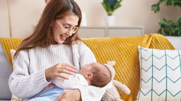 Mother Son Sitting Sofa Breastfeeding Baby Home — Stock Photo, Image