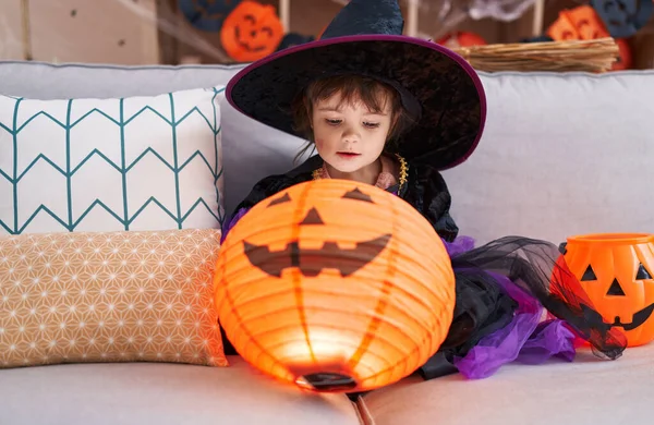 Adorable Hispanic Girl Wearing Halloween Costume Holding Pumpkin Basket Lamp — Stockfoto