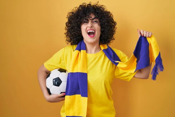Young Brunette Woman Curly Hair Football Hooligan Holding Ball Angry — Stock Photo, Image