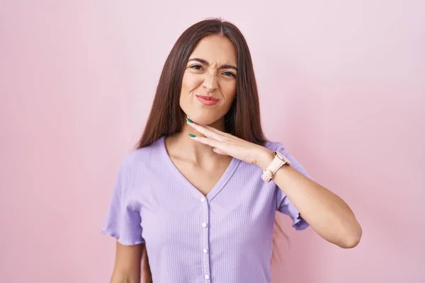 Young Hispanic Woman Long Hair Standing Pink Background Cutting Throat — 스톡 사진