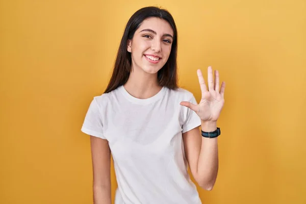 Young Beautiful Woman Standing Yellow Background Showing Pointing Fingers Number — Fotografia de Stock