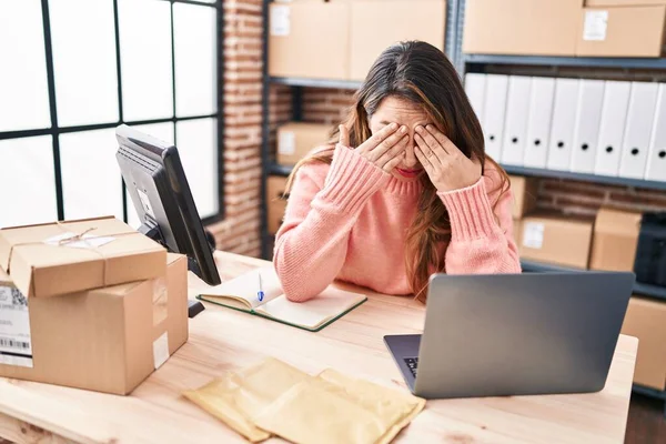 stock image Young beautiful hispanic woman ecommerce business worker stressed working at office