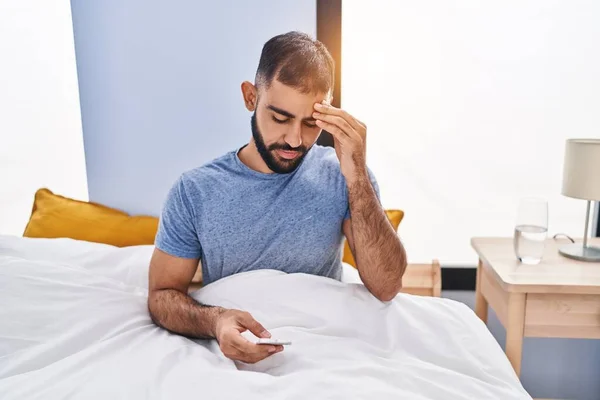 Young Hispanic Man Taking Pills Headache Sitting Bed Bedroom — Stock Photo, Image