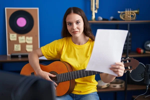 Young Woman Musician Playing Classical Guitar Music Studio — Stockfoto