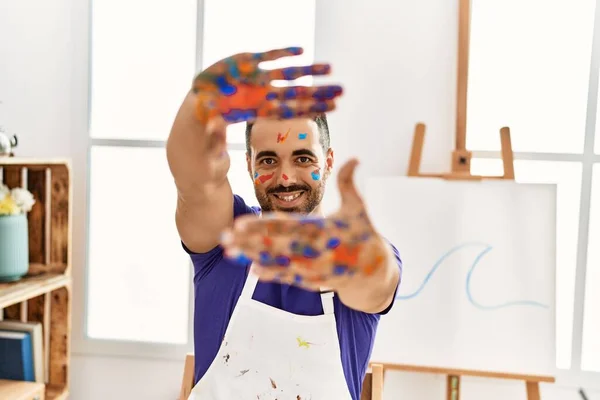 Young Hispanic Man Smiling Confident Showing Painted Palm Hands Art — ストック写真