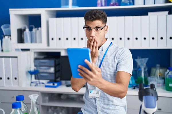 Young Hispanic Man Working Scientist Laboratory Doing Video Call Covering — Foto de Stock