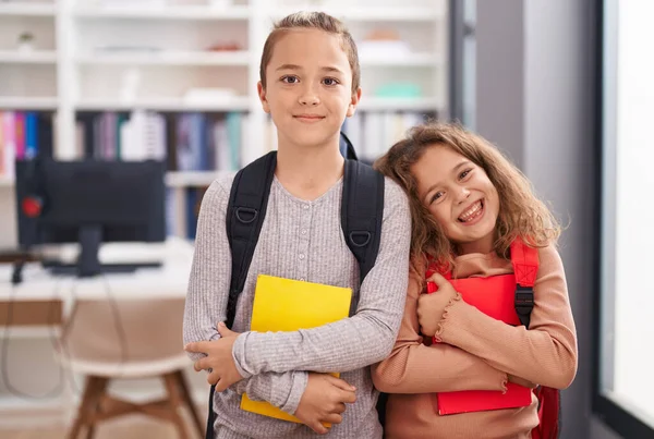 Two Kids Students Wearing Backpack Holding Book Classroom — Foto Stock