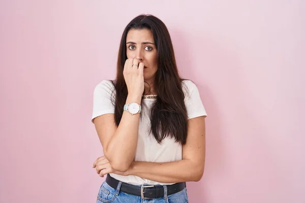 Young Brunette Woman Standing Pink Background Looking Stressed Nervous Hands — Foto de Stock