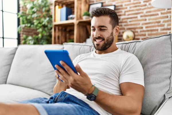 Young Hispanic Man Smiling Confident Using Touchpad Home — Stock Photo, Image