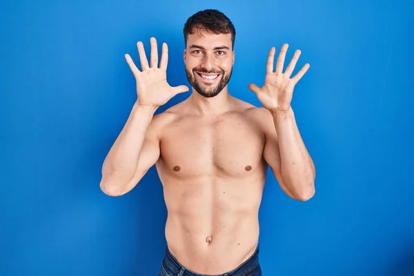 Handsome Hispanic Man Standing Shirtless Showing Pointing Fingers Number Ten — Stock Fotó