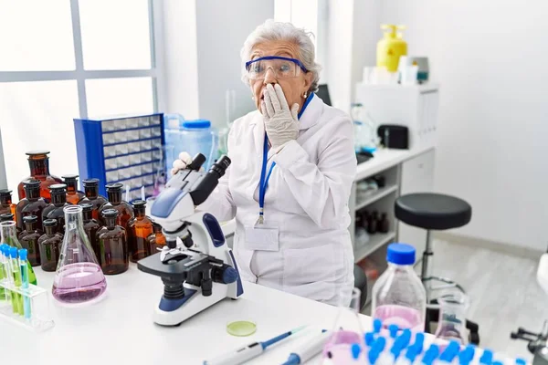 Senior Woman Grey Hair Working Scientist Laboratory Covering Mouth Hand — Stock Photo, Image