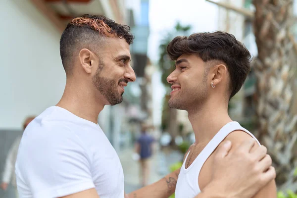 Two Hispanic Men Couple Smiling Confident Hugging Each Other Street — стоковое фото