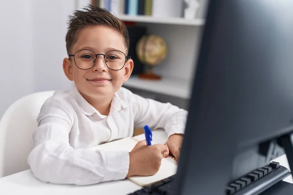 Adorable Hispanic Boy Student Using Computer Writing Notebook Classroom — Photo