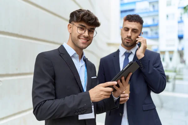 Two Hispanic Men Business Workers Using Touchpad Talking Smartphone Street — Foto de Stock