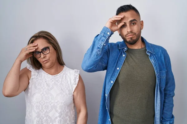 Hispanic Mother Son Standing Together Worried Stressed Problem Hand Forehead — Stockfoto